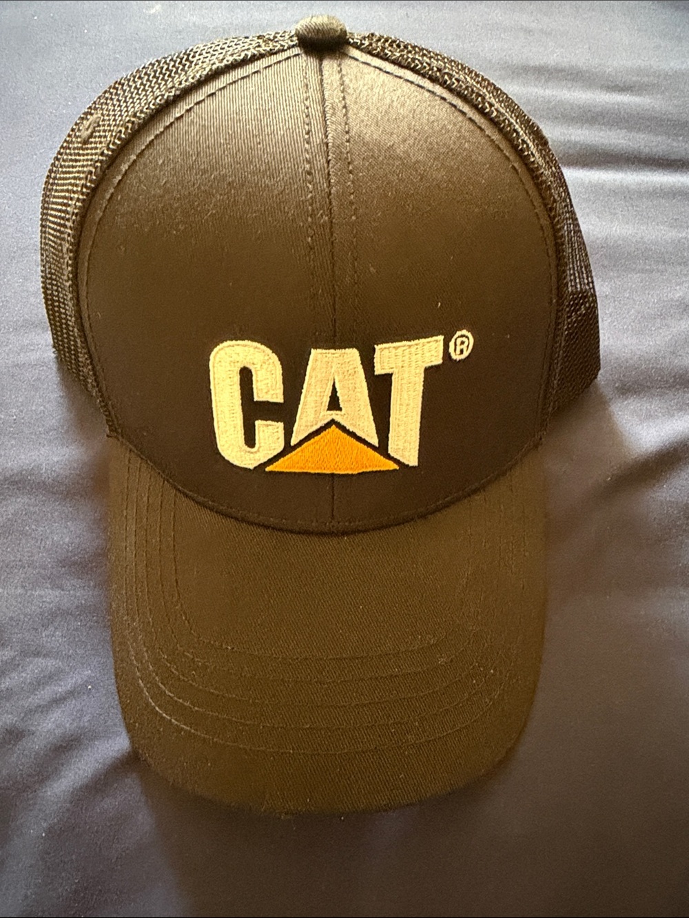 Caterpillar Black Trucker Hat with Yellow Logo